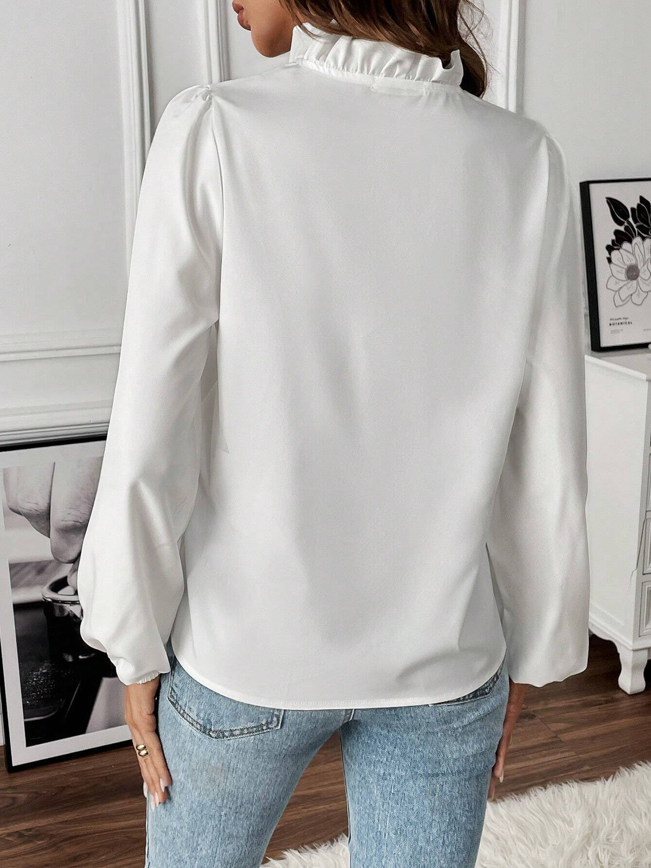 K802 - Blusa ribete con fruncido de manga farol