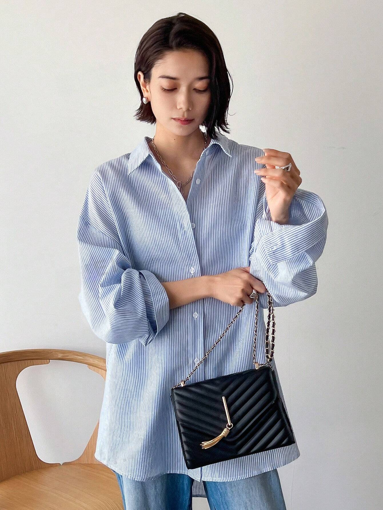 M1523 - Blusa a rayas con botones en la parte delantera