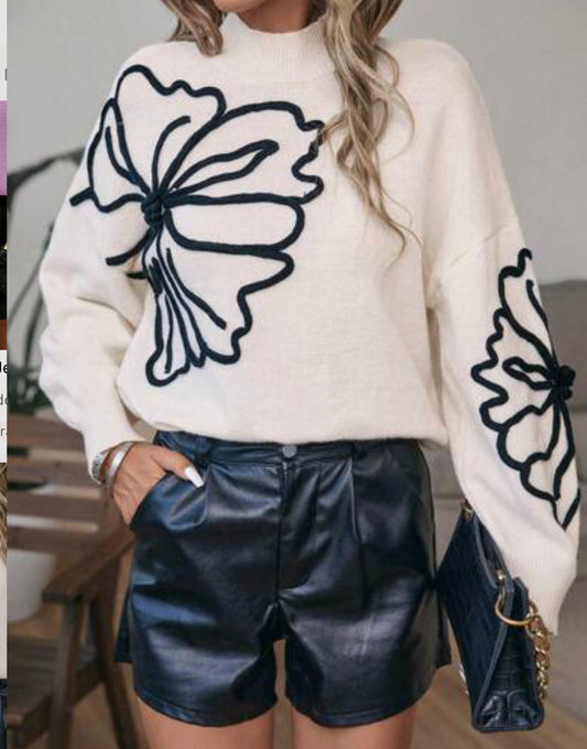 ST130 Jersey con patrón floral de hombros caídos de cuello alto