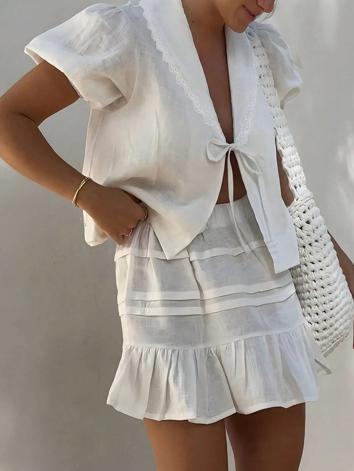 ST00029 Blusa holgada de manga abullonada con panel de encaje y lazo frontal, unicolor para mujer, verano