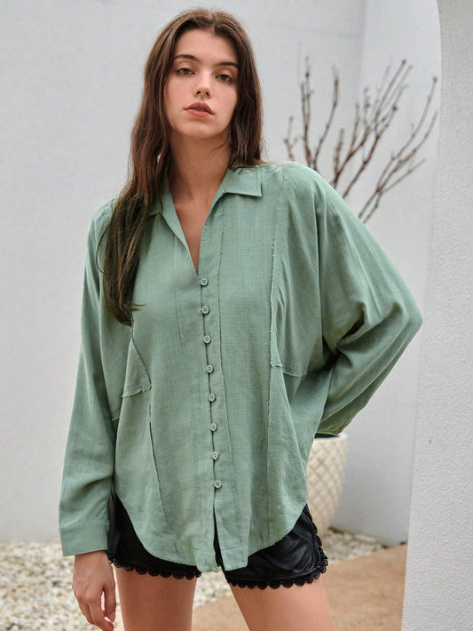 ST082 - Camisa unicolor de manga murciélago